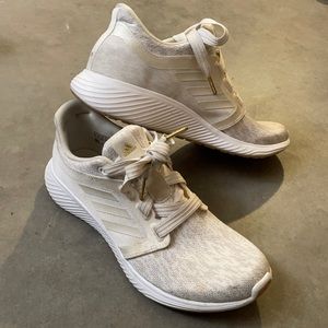 White/beige Nike shoes